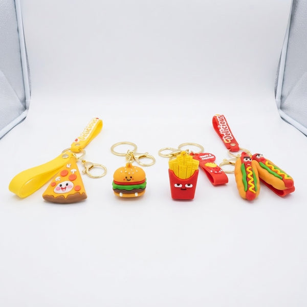 Colorful Snack Pop 3D Fast-Food Keychain collection featuring pizza, burger, fries, and hot dogs on keyrings.