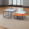 Elegant Coffee Table Set featuring a modern nesting design with an orange accent drawer in a stylish living room.