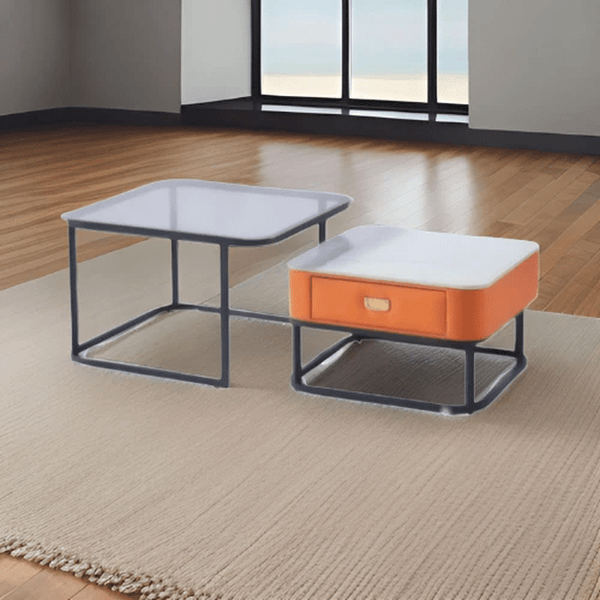 Elegant Coffee Table Set featuring a modern nesting design with an orange accent drawer in a stylish living room.
