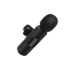 The Wireless Lavalier Microphone for iPhone & iPad shown in black, featuring a clip for easy attachment and a foam windscreen.