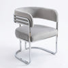 Luxury Tiffany Event and Dining Chair featuring a modern design with chrome accents and plush gray upholstery.