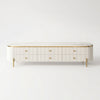 Modern Fluted White TV Stand with Faux Marble Top featuring elegant textured details and gold accents.