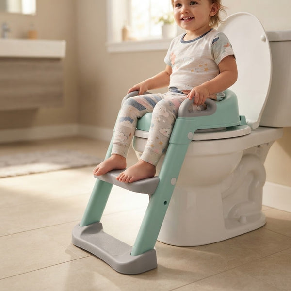 Child sitting on Foldable Children Potty Training Toilet Seat with Step Ladder, smiling and comfortably using the toilet.