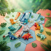 Colorful 3D Cartoon Dinosaur Keychain collection displayed on vibrant hexagonal background with tropical leaves.