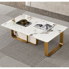 Sintered Stone Coffee Table with Stainless Steel Frame displayed in living room with decorative items on top.