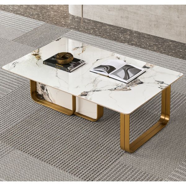 Sintered Stone Coffee Table with Stainless Steel Frame displayed in living room with decorative items on top.