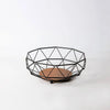 Geometric Iron Fruit Storage Basket with black metal frame and wooden base for fresh fruit organization.