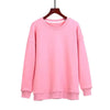 Custom Printing Men Tie Dye Sweatshirt in pink hanging on a wooden hanger.