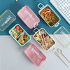 Airtight Compartment Lunch Box with colorful compartments holding various organized meals on a table with utensils.