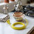 Home kitchen setup featuring a 1200W Portable Immersion Water Boiler cord, kettle, bowl, and utensils.