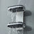 Bathroom Plastic Wall-mounted Double Layer Shelf showcasing water running over its surfaces, ideal for organizing bathroom essentials.