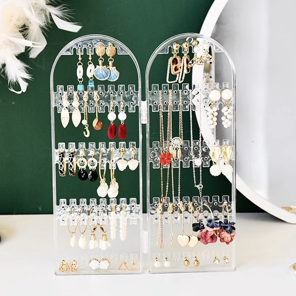 Capacity Plastic Folding Jewelry Holder displaying earrings and necklaces in an organized manner.