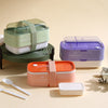Collapsible Double-Layer Lunch Box in various colors, featuring a modern design for convenient meal storage.