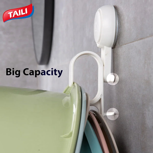 Removable Wall-Mounted Plastic Suction Cup holding multiple bowls on a wall for organized storage
