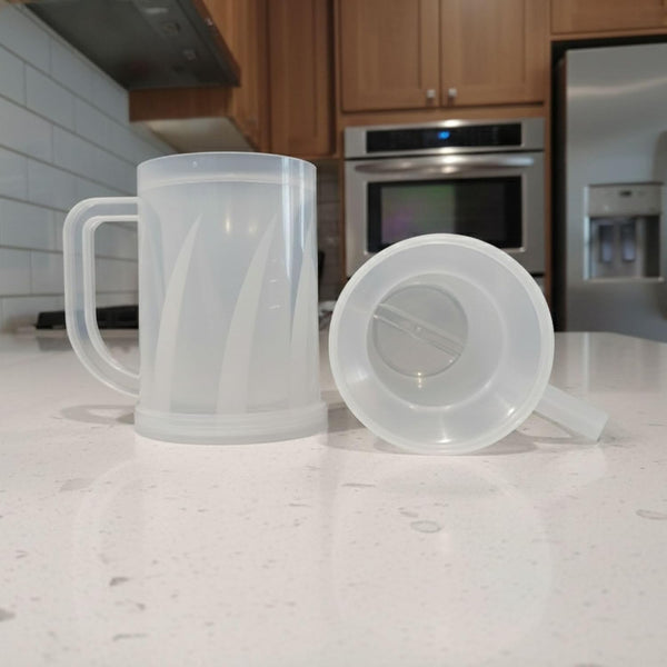 Double Layer Reusable Drink Mug on a kitchen counter, showcasing its double-layer design for insulation.