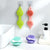 Double-sided Pet Grooming Brush in vibrant colors for effective pet grooming and bathing.