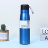 Dual Vacuum Insulated Stainless Steel Water Bottle in blue color with black lid and branding.