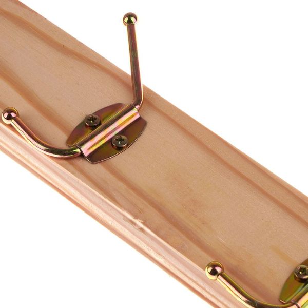 Wooden Wall-Mounted Coat Rack with gold hooks, perfect for organizing coats and bags in entryways or bedrooms.