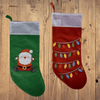 Festive Felt Christmas Stockings 40cm - Green one with Santa and red one with colorful lights on wooden background.