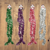 Festive Tinsel Garland 11cm x 2m shown in green, purple, red, and silver colors on a wooden background.