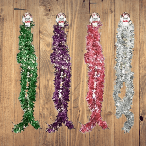 Festive Tinsel Garland 11cm x 2m shown in green, purple, red, and silver colors on a wooden background.