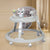 Foldable Anti-Tip Baby Activity Walker featuring engaging toys and a safe design for babies.