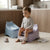 Child sitting on a Kids Potty Training Seat with Removable Insert, showcasing early toilet training at home.