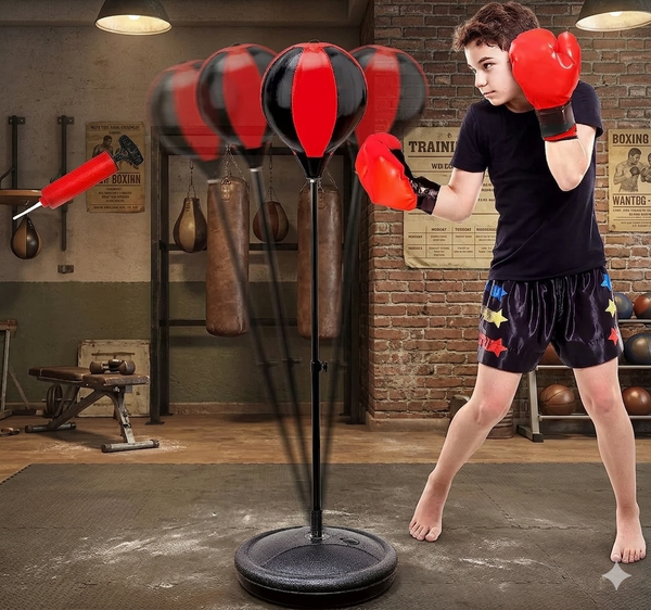 Height Adjustable Freestanding Reflex Bag Kit in use by a boy improving hand-eye coordination and fitness.