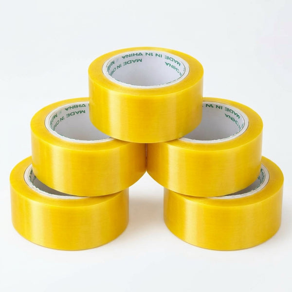 Secure Seal Clear Packing Tape Roll - stack of yellow packing tape rolls for secure sealing.