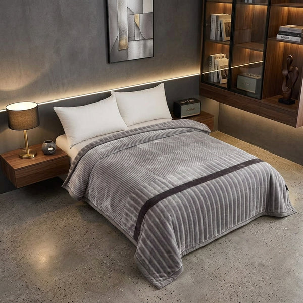 Soft Printed Blanket displayed on a stylish bed with a modern home décor setting.