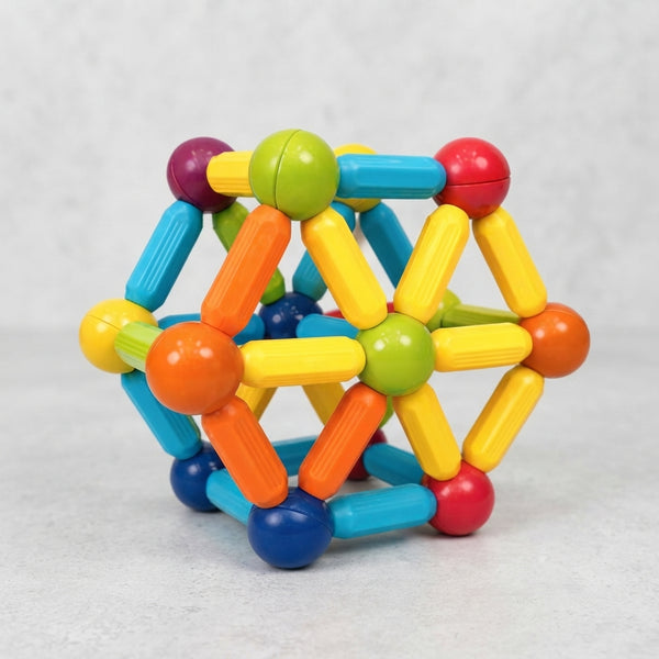 Rainbow Magnetic Construction Sticks & Balls Set built into a colorful geometric shape.
