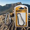 8x80mm Lockable Mountaineering Buckle in packaging, heavy-duty carabiner on rocky outdoor terrain.