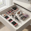 Seven-Piece Storage Box Set organized makeup products in drawer for efficient storage and easy access.