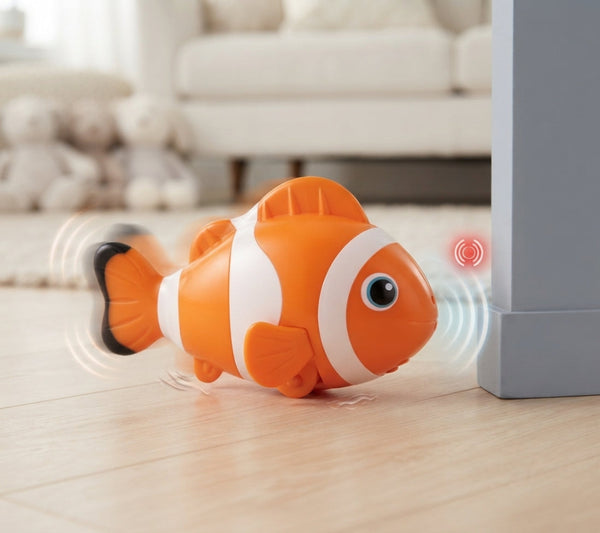 Interactive Clownfish Crawling Toy moving towards a wall, showcasing its colorful design and engaging features.