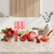 Painless Strawberry Hard Wax Block displayed with fresh strawberries and a bowl of wax, showcasing the product's appeal.