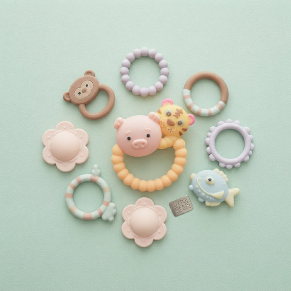 Baby Sensory Rattle & Teether Toy Set featuring colorful animal shapes and textured rings for babies.