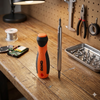 A 6-in-1 Magnetic Screwdriver Bit Set on a wooden workbench, ideal for home or office repairs.