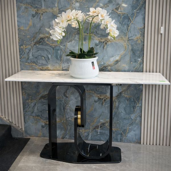 Golden & White Marble Console Table with flowers against a stylish marble wall.