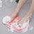 Non Slip Shower Foot Scrubber Massager in use, showing feet on a texturized surface with soap lather.