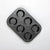 6 Cup Non-Stick Carbon Steel Muffin Pan with six cavities for baking muffins or cupcakes.