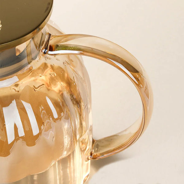 Elegant Large Capacity All-Glass Tea Set with a clear glass handle and stylish lid for modern tea serving.
