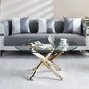 Luxury Round Dining Table featuring a modern glass top and elegant gold base, paired with a stylish gray sofa.