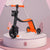 3-In-1 Height Adjustable Children's Kick Scooter in vibrant orange and black design on a display platform.