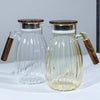 High-Temperature Resistant Dining Table Placemat featuring elegant ribbed glass pitchers with wooden lids.