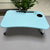 Dormitory Bed Folding Small Table with a light blue surface and cup holder, ideal for small spaces and multi-purpose use.