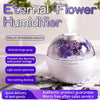 Mini Ultrasonic Cool Mist Humidifier with delicate floral design and mist feature for improved air quality.
