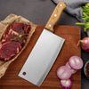 Heavy Duty Stainless Steel Bone Chopping Butcher Cleaver placed with meat and vegetables on a wooden cutting board.