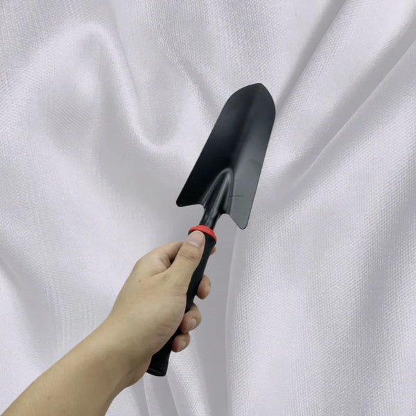 Outdoor Gardening Hand Shovel held in hand against a white backdrop, ideal for potted plants and precision gardening.