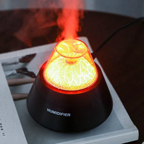 USB Mini Volcano Humidifier creating a soothing mist with glowing light, perfect for improving air quality in any room.