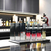 Essential Amino Acid-Infused Hair Care products displayed on a counter, showcasing revitalizing hair treatment.